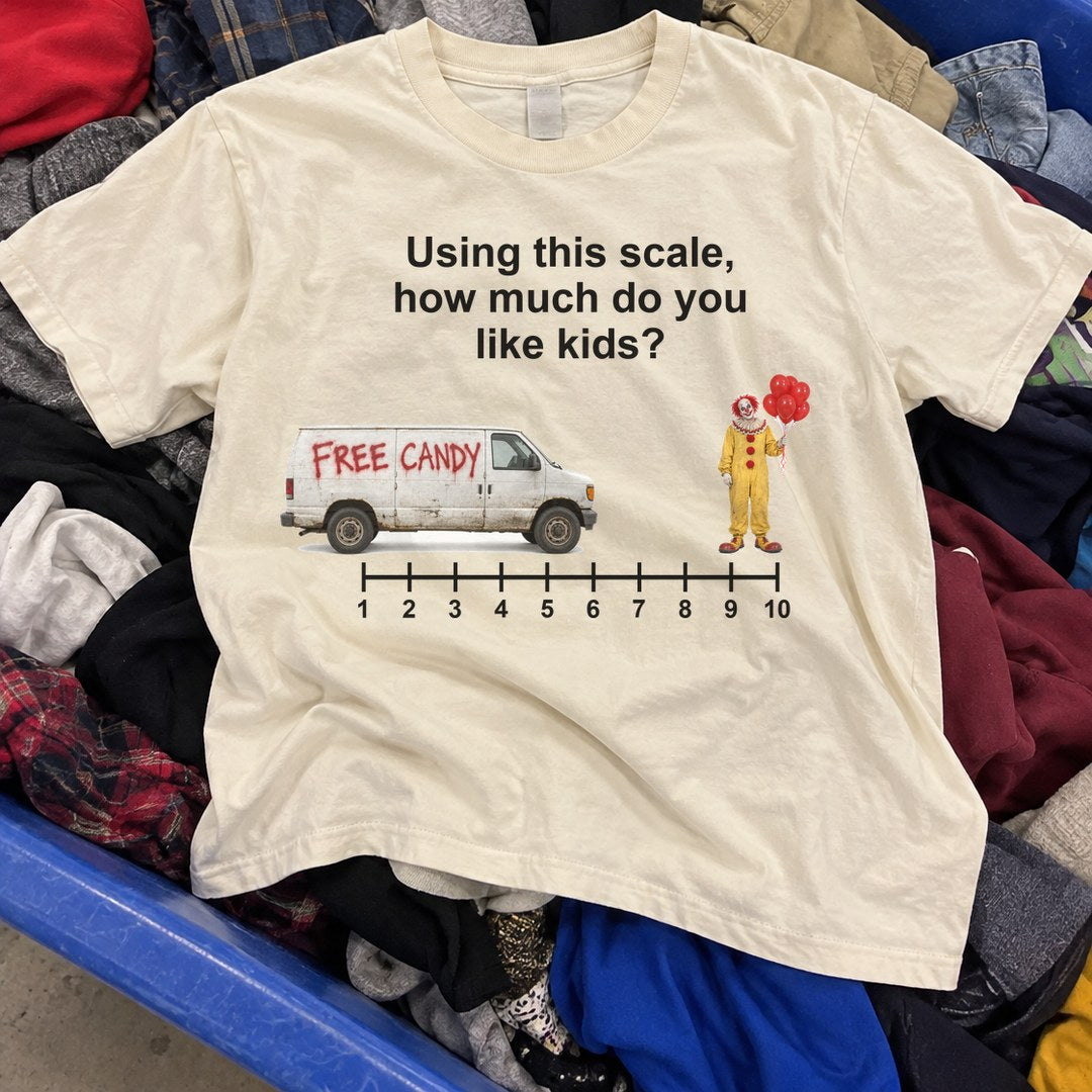 How Much Do You Like Kids Scale Shirt found in a thrift store bin