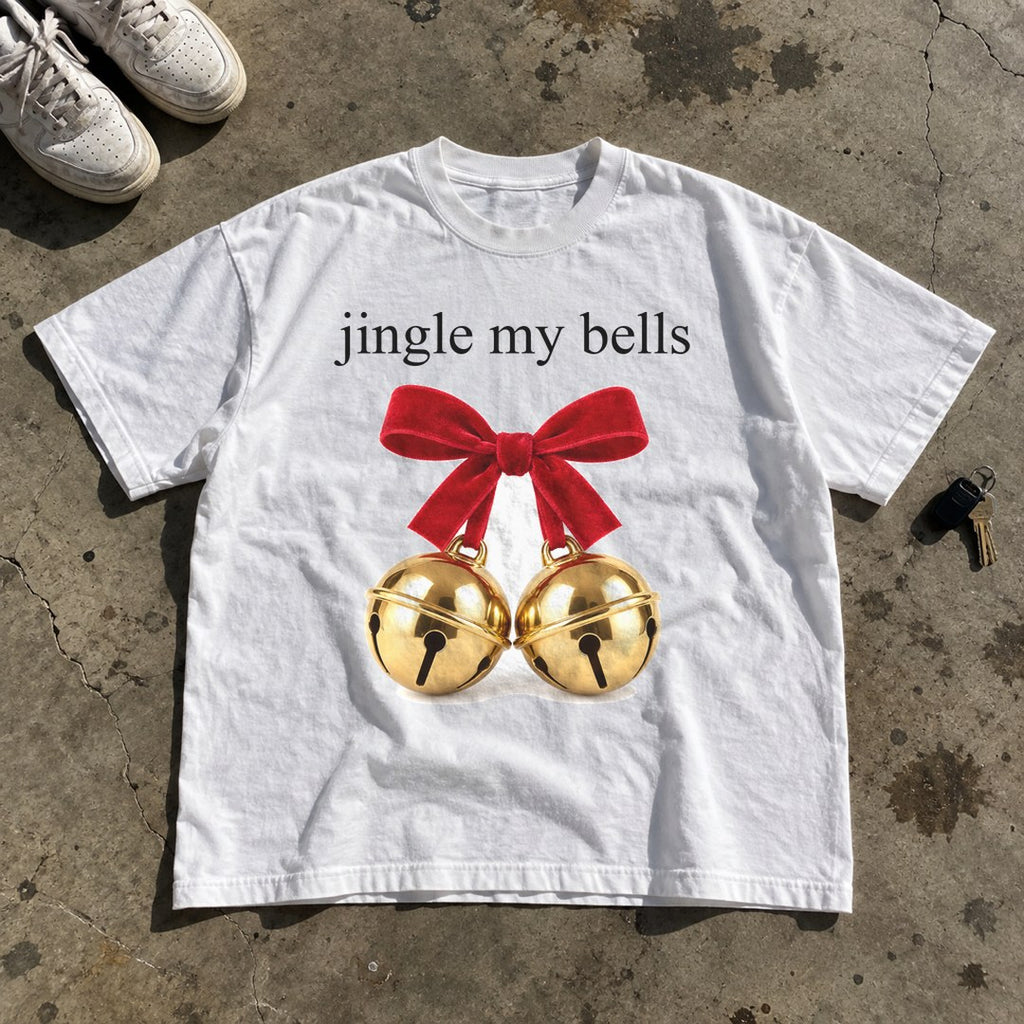 Jingle My Bells Shirt laid flat on a concrete garage floor