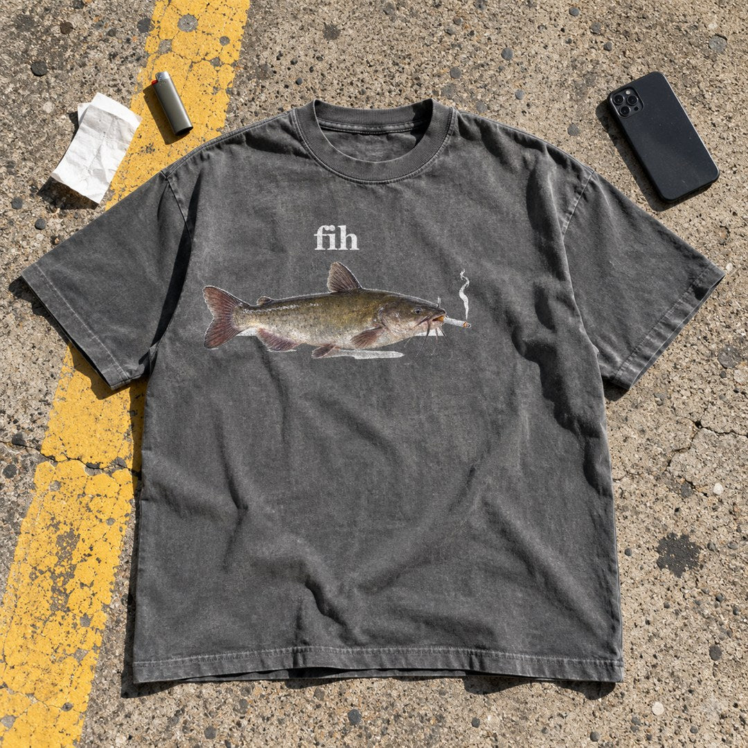 Fih Shirt laid flat on a parking lot