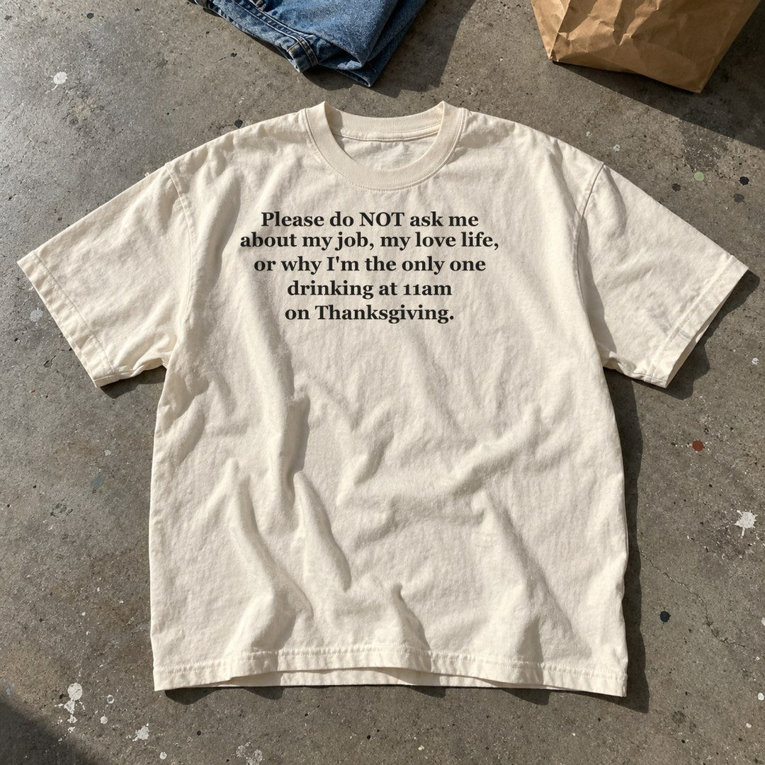 Do Not Ask Me on Thanksgiving Shirt laid flat on a basement floor