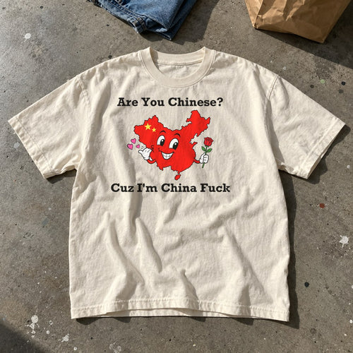 Are You Chinese Shirt laid flat on a concrete floor