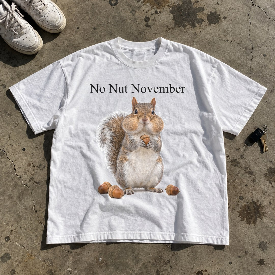 No Nut November Shirt laid flat on a concrete garage floor