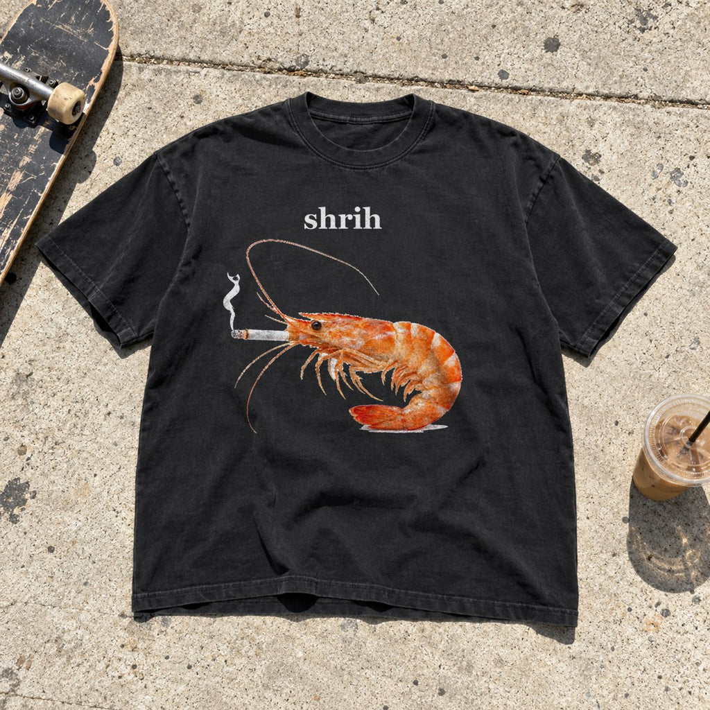 Shrih Shirt laid flat on a city sidewalk