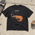 Shrih Shirt laid flat on a city sidewalk