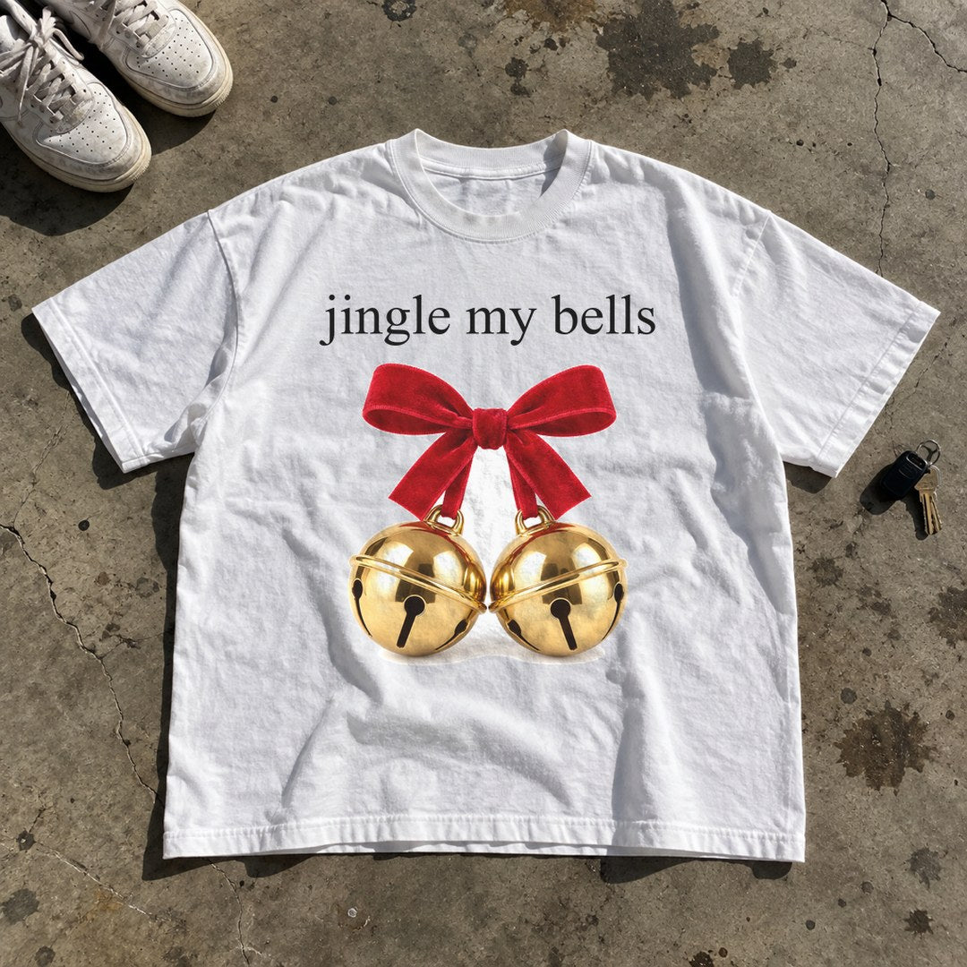 Jingle My Bells Shirt laid flat on a concrete garage floor