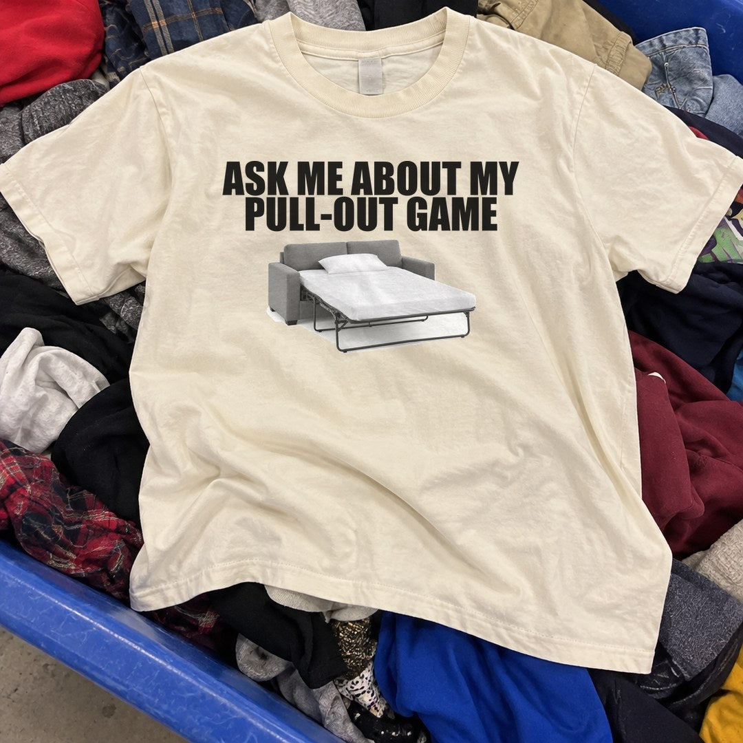 Ask Me About My Pull-Out Game Shirt found in a thrift store bin