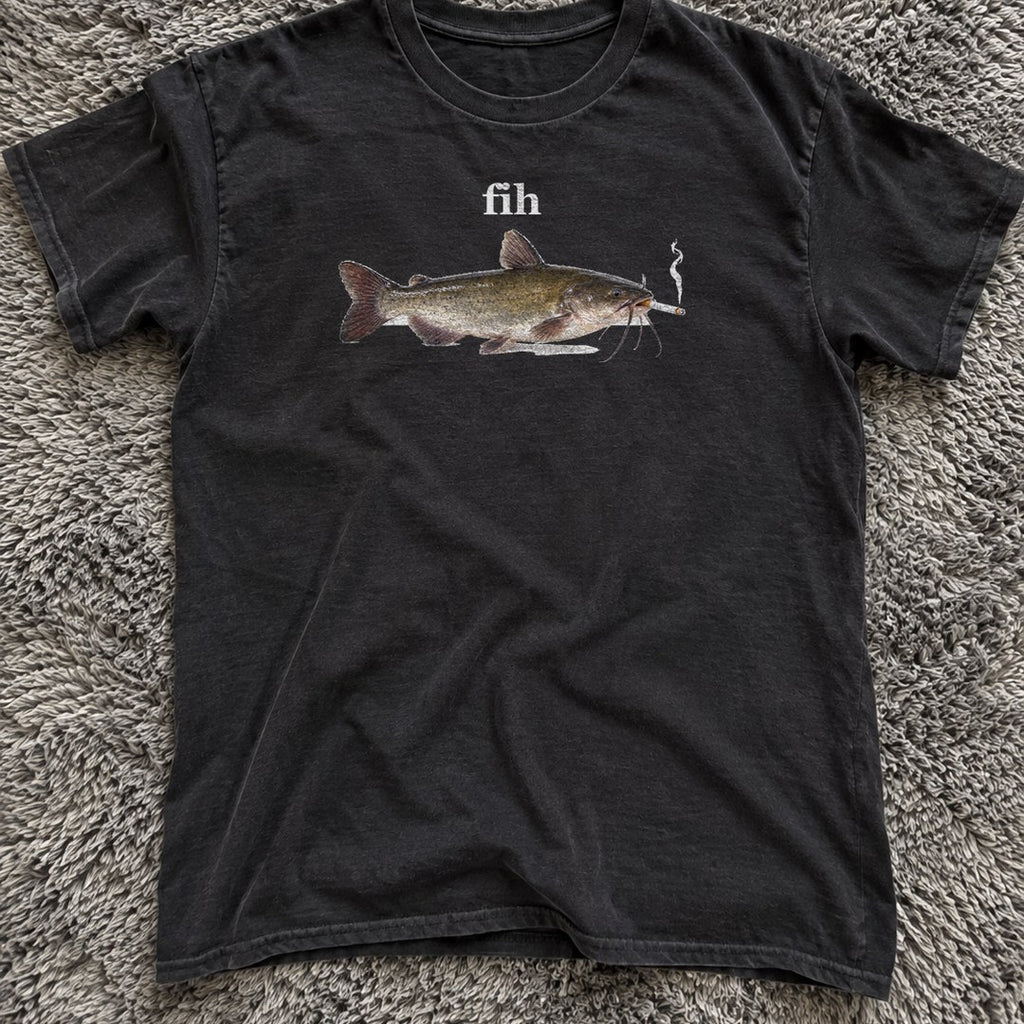 Fih Shirt on a shag rug