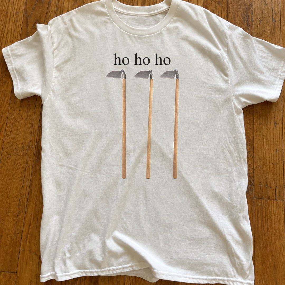 Ho Ho Ho Shirt on a wood floor