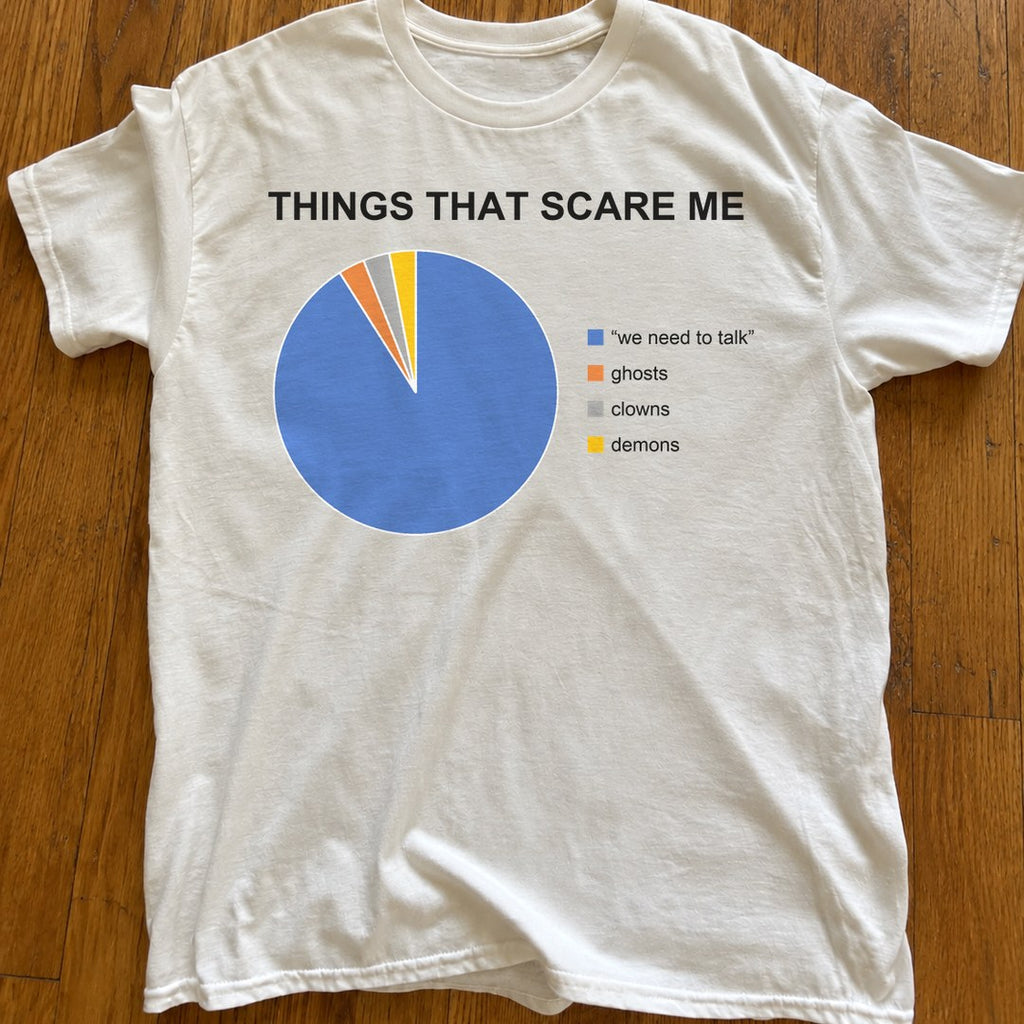 Things That Scare Me Shirt on a wood floor