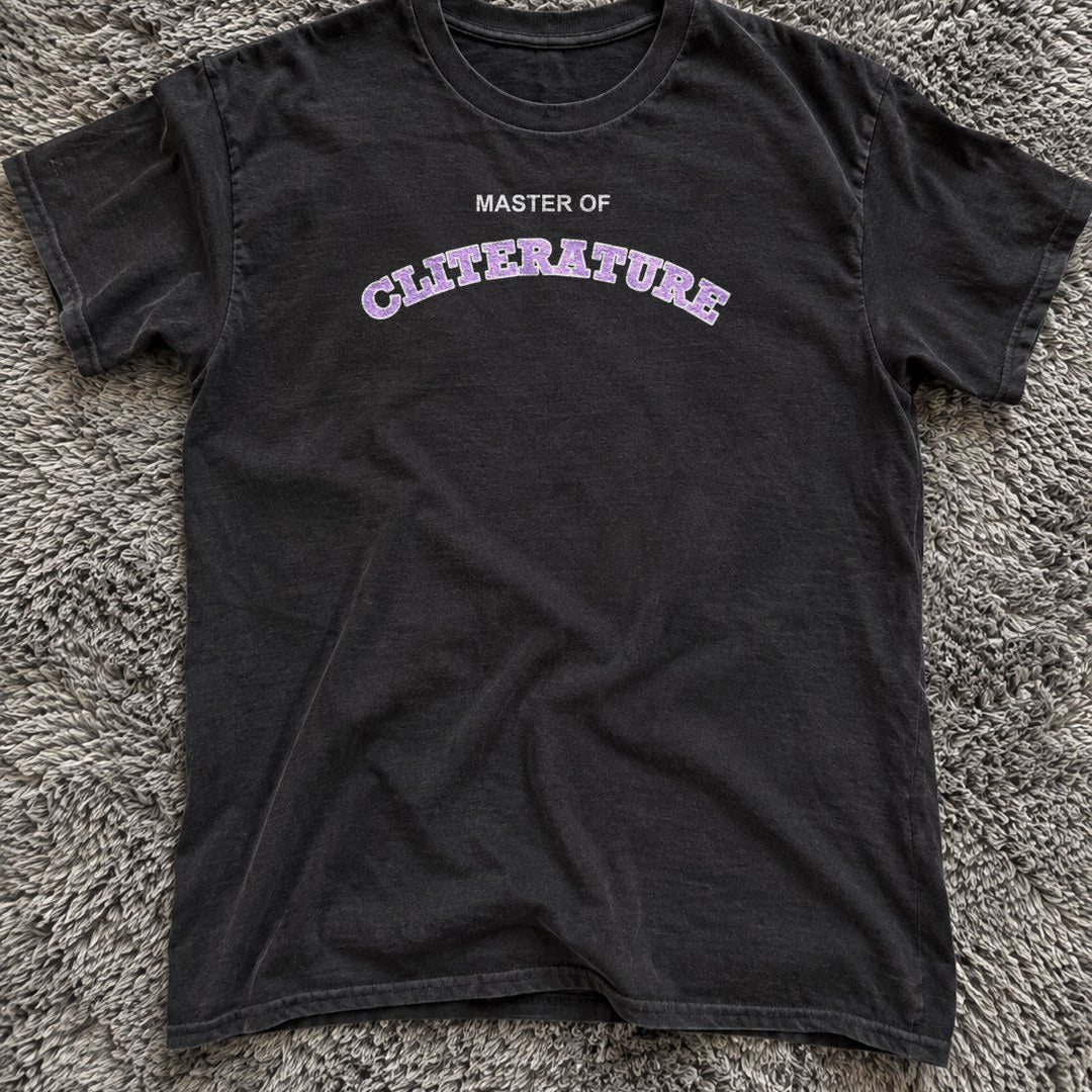 Master of Cliterature Shirt on a shag rug