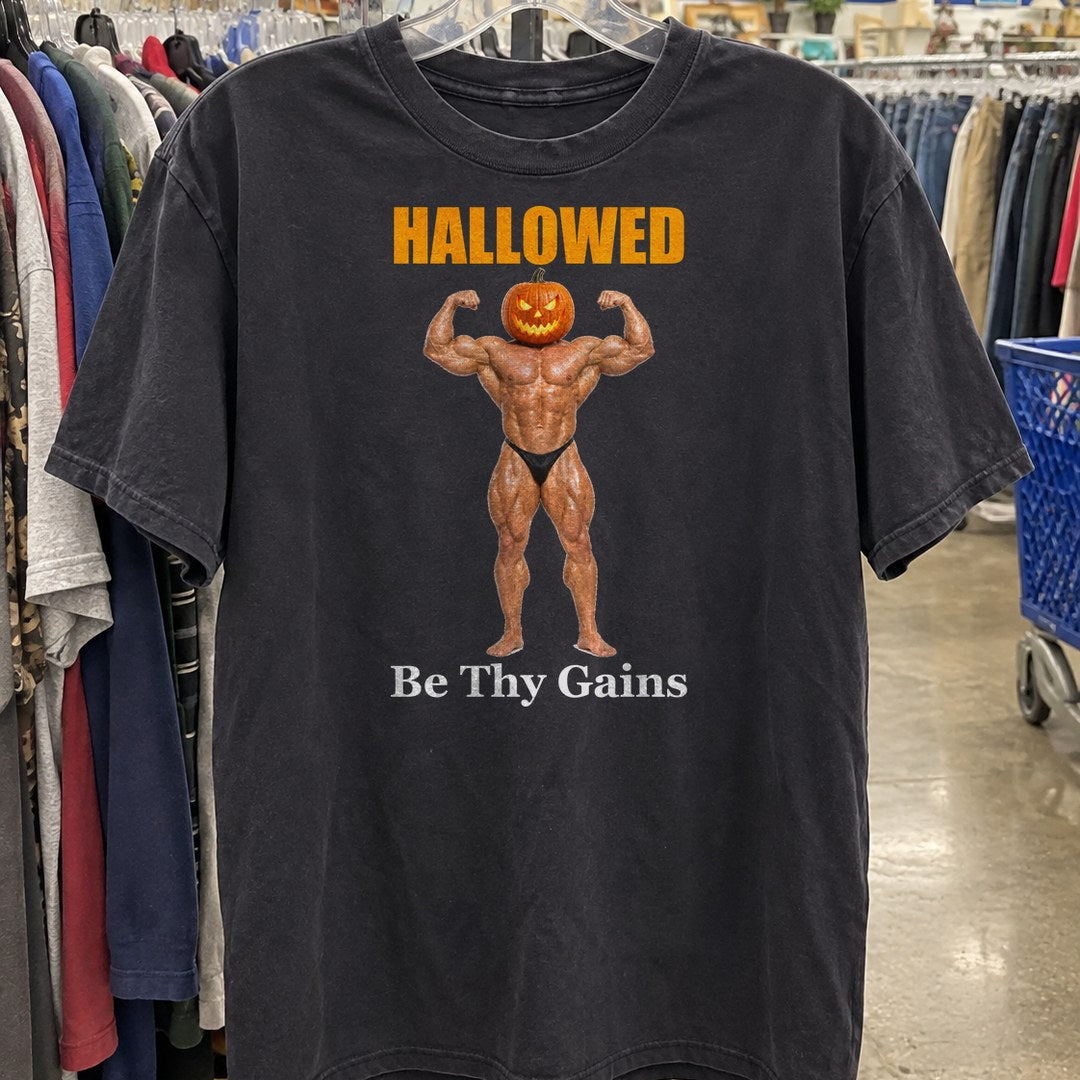 Hallowed Be Thy Gains Shirt on a thrift store rack