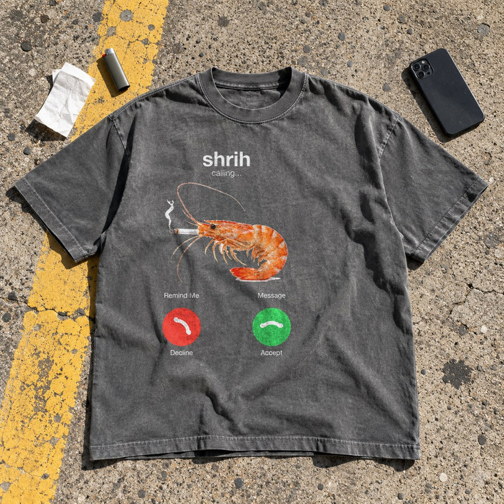 Shrih Calling Shirt laid flat in a parking lot