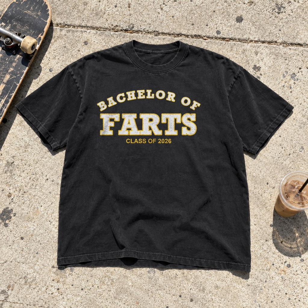 Bachelor of Farts Shirt laid flat on a sidewalk