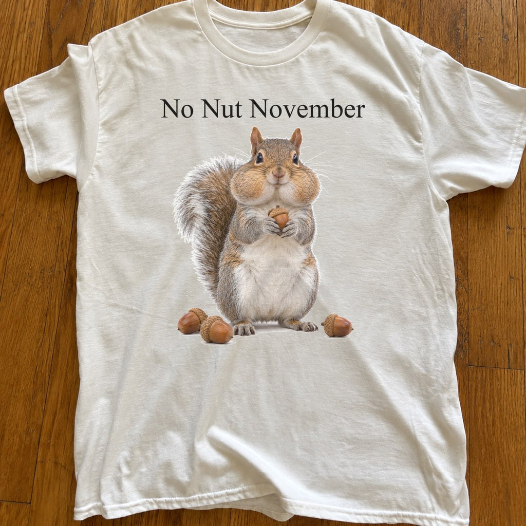 No Nut November Shirt on a wood floor