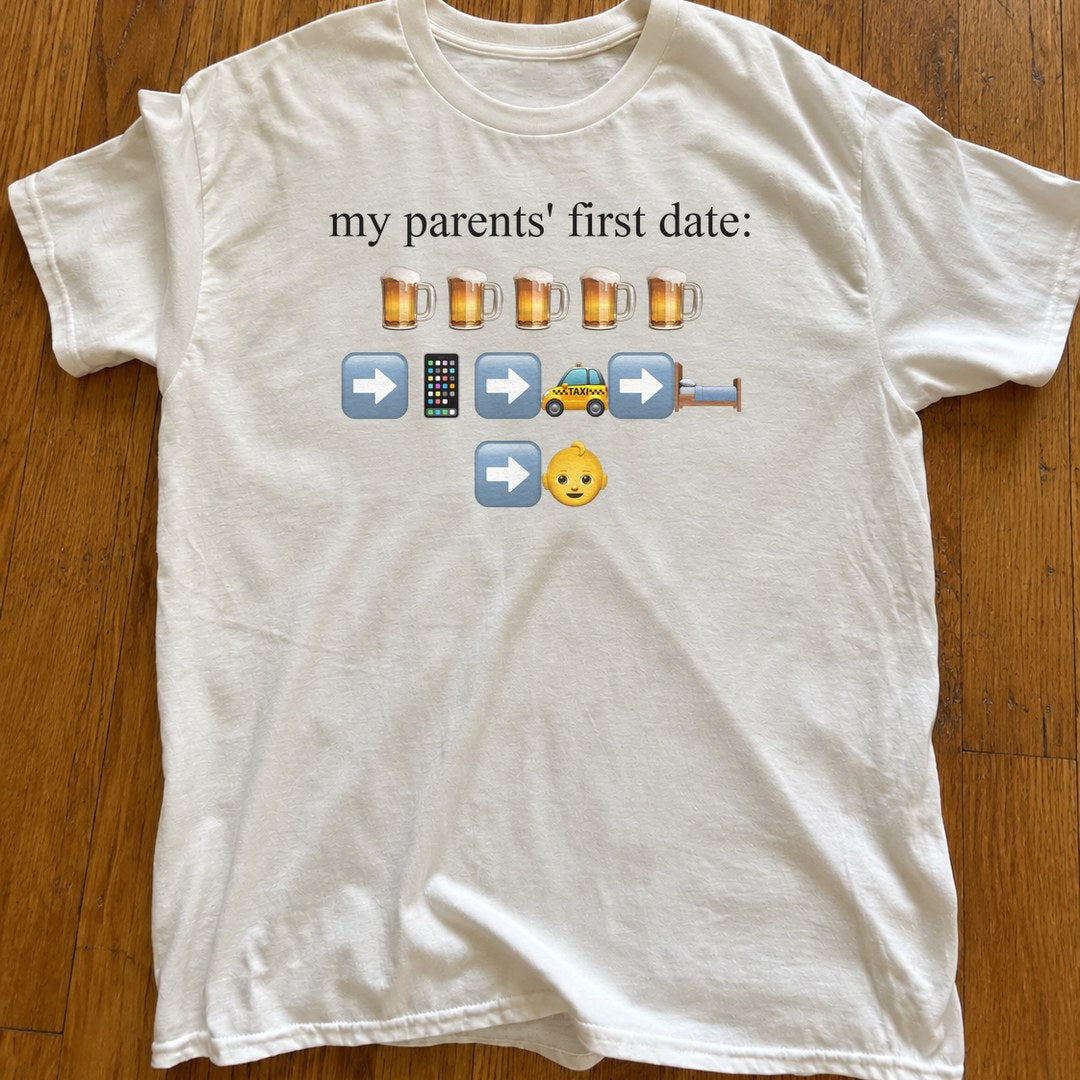 My Parents' First Date Shirt on a wood floor