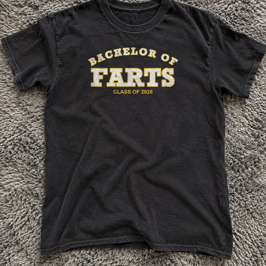 Bachelor of Farts Shirt on a grey rug