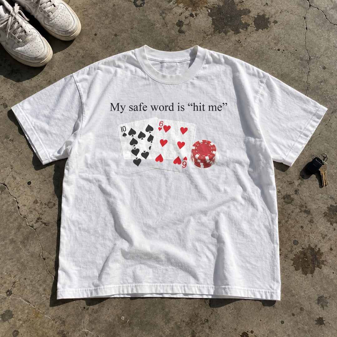 My Safe Word Is Hit Me Shirt laid flat on a concrete garage floor