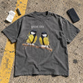 Great Tits Shirt laid flat on a parking lot